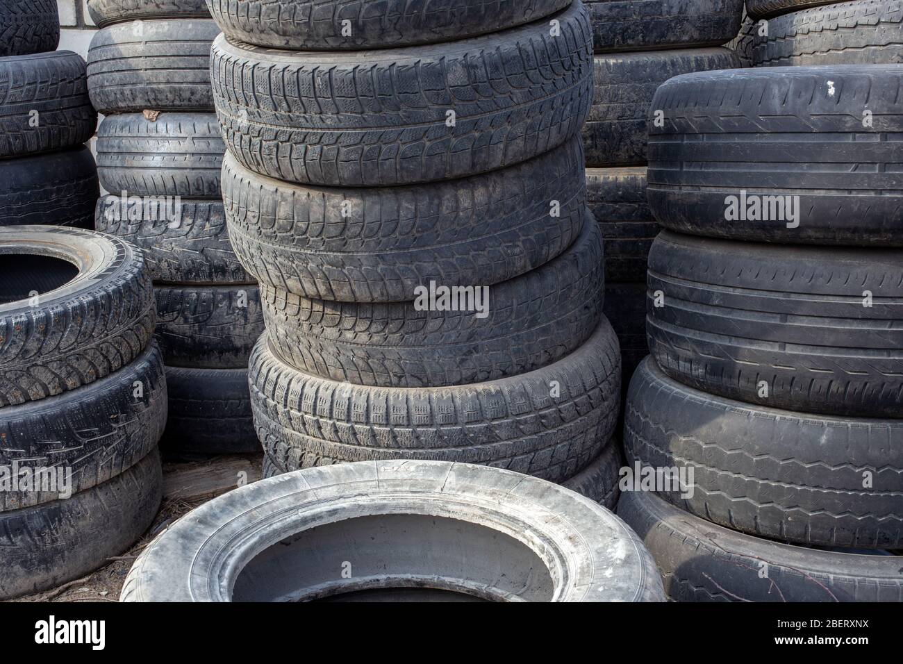 old used small car tires stacks full frame background Stock Photo Alamy