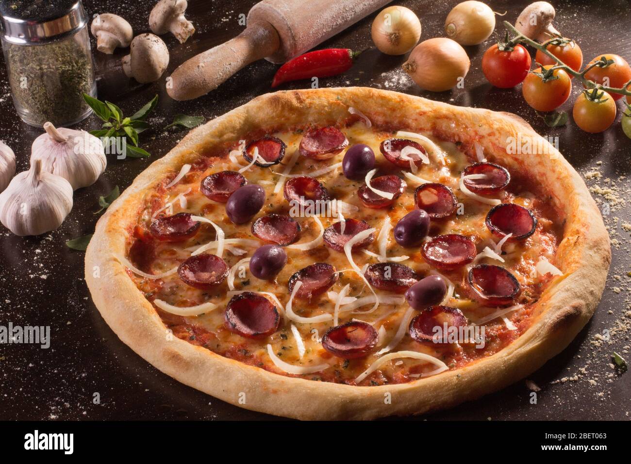Brazilian Calabresa Pizza with olives and onions Stock Photo