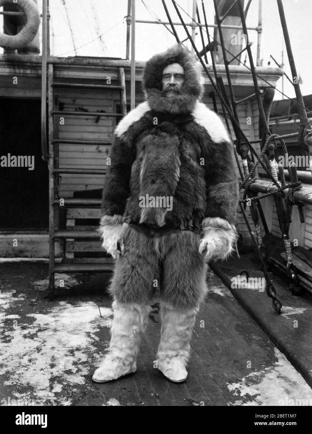 Admiral Robert Peary wearing fur clothing aboard the deck of SS Roosevelt, 1909 Stock Photo