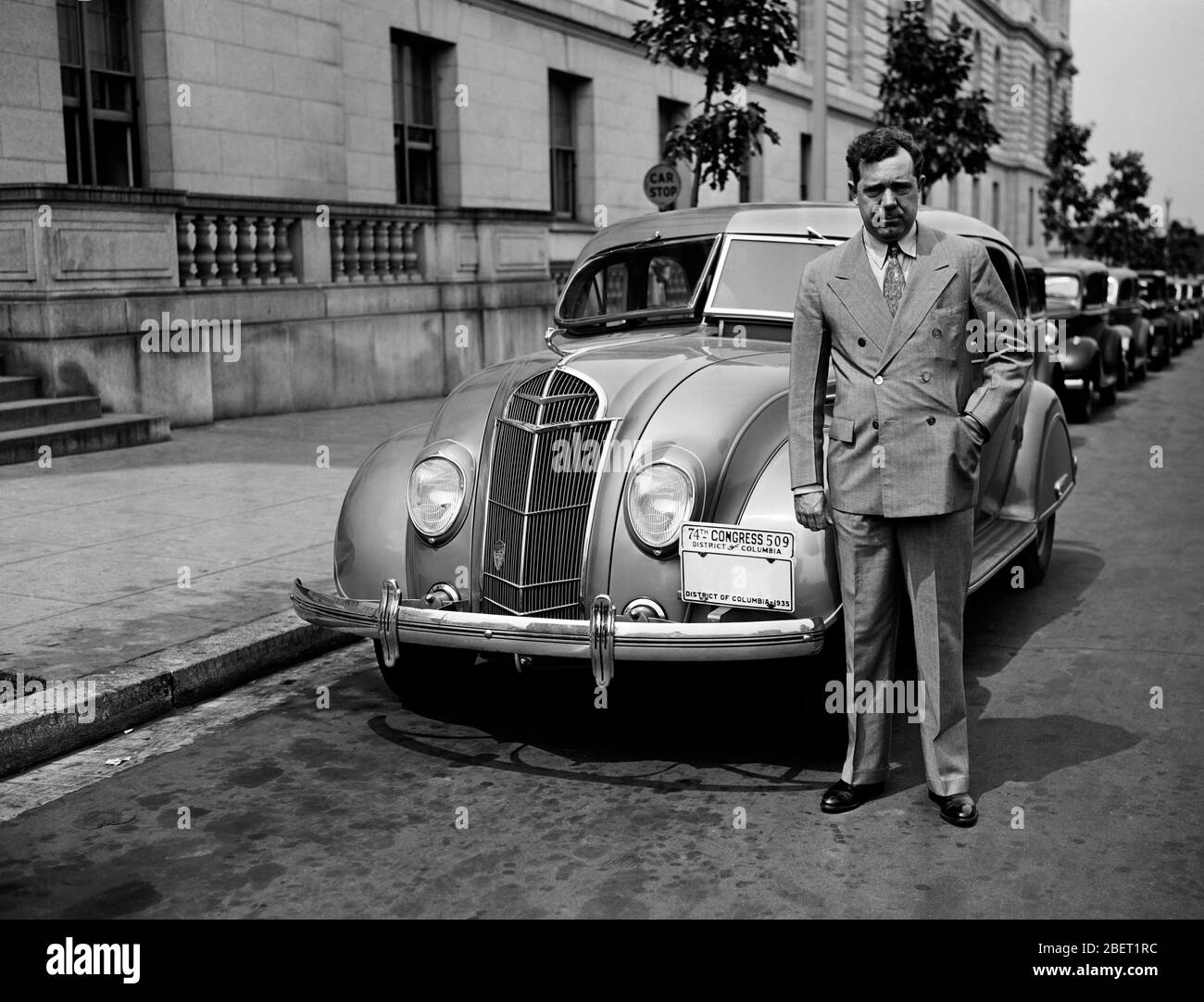 Senator Huey Long with his car in Washington D.C., 1935. Stock Photo