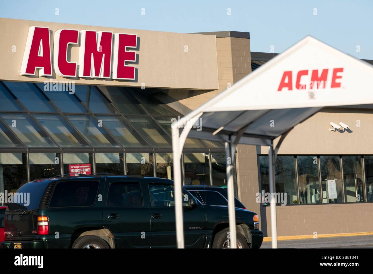 A logo sign outside of a Acme Markets retail grocery store location in Newark, Delaware on April 11, 2020. Stock Photo