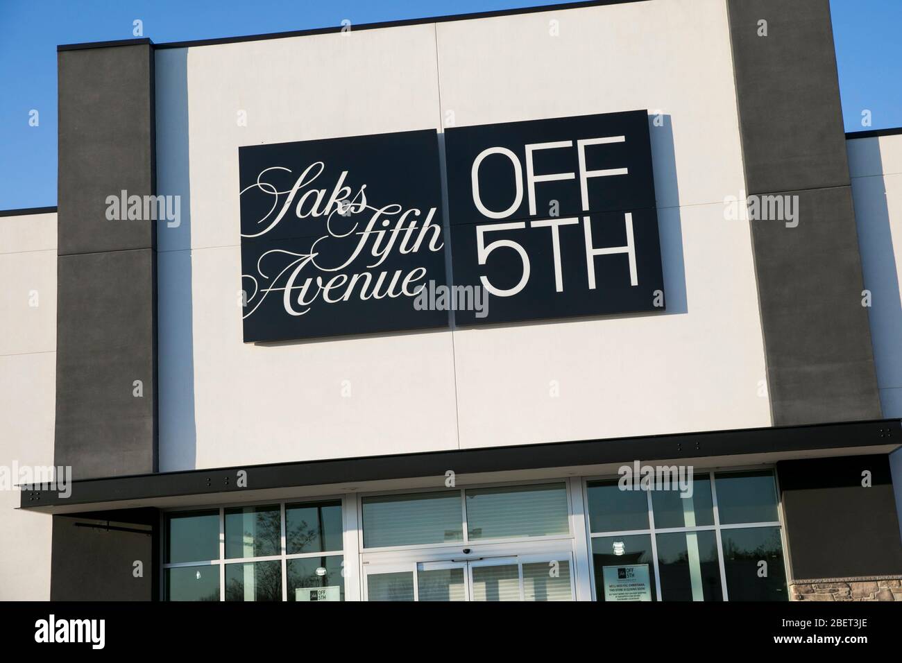 A logo sign outside of a Saks Fifth Avenue OFF 5TH (Saks Off Fifth