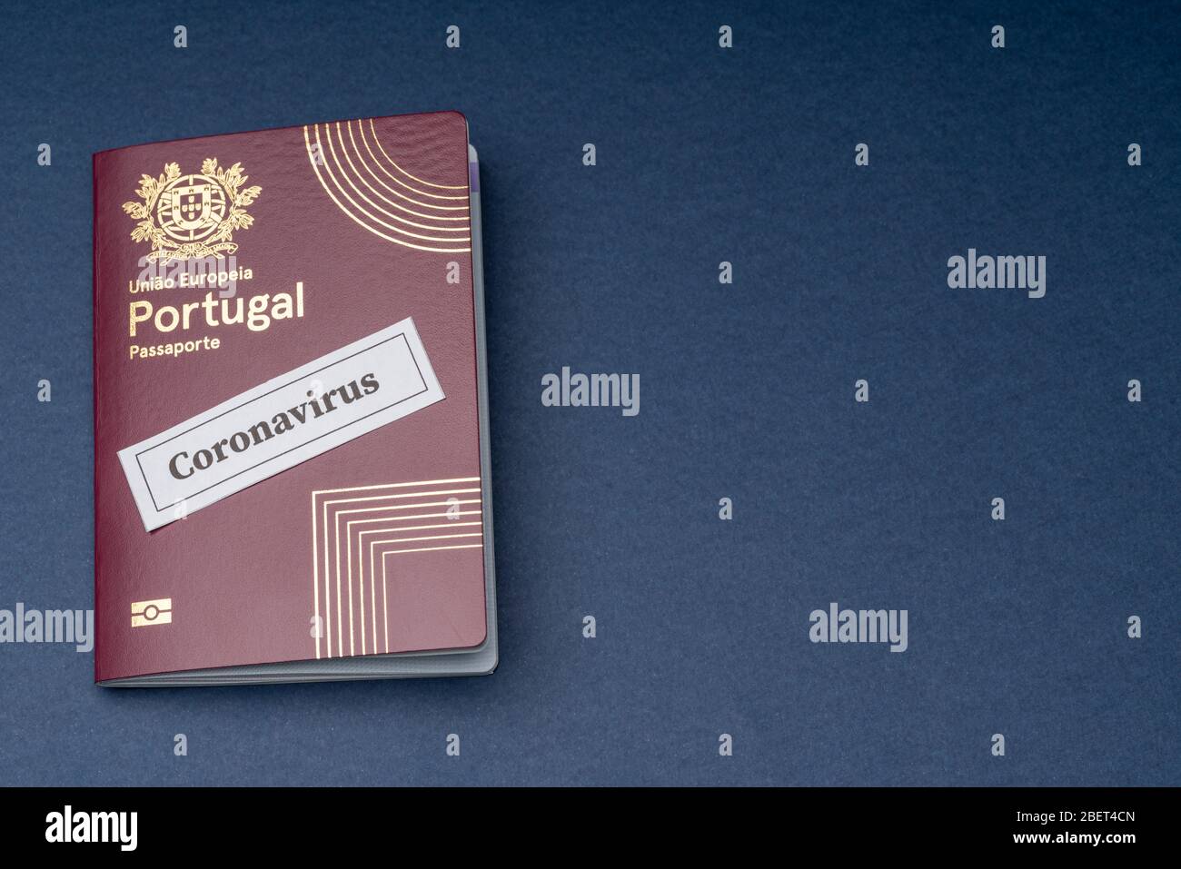 Portuguese European travel passport on a blue background. Stock Photo