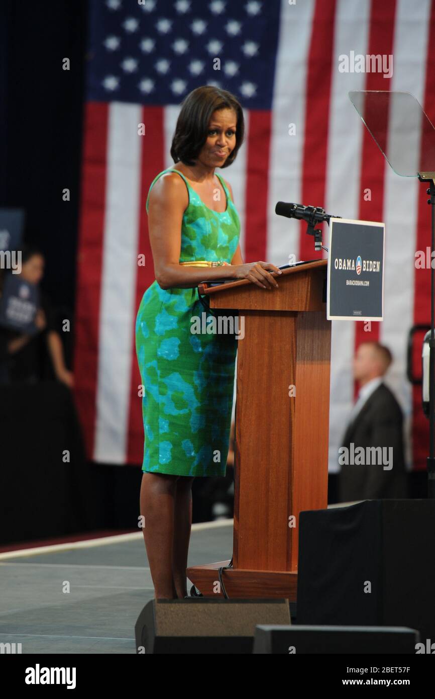 MIAMI LAKES, FL - JULY 10:  First lady Michelle Obama speaks to supporters and volunteers at the Barbara Goleman High School on July 10, 2012 in Miami Stock Photo