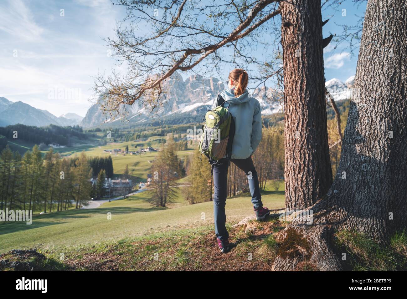 Girl sitting on high hill hi-res stock photography and images - Alamy