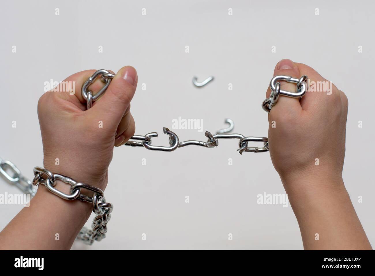 Broken chain hands freedom hires stock photography and images Alamy