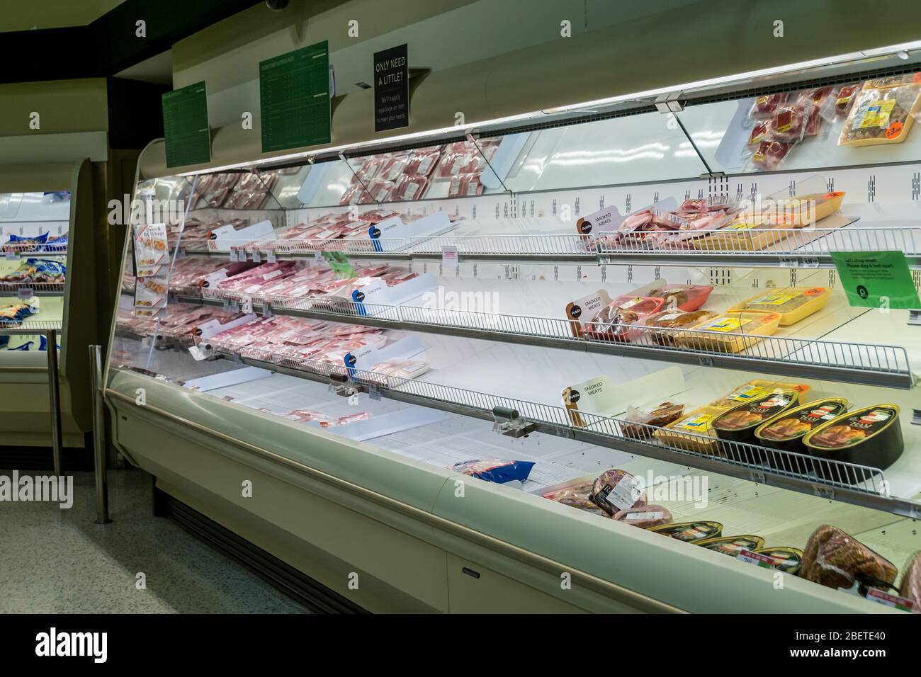 Atlanta, GA / USA 04/02/20 A guy checking out the meat section at
