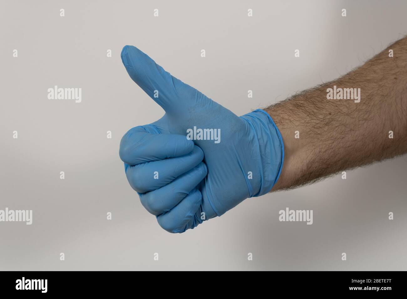Safety glove thumbs up hi-res stock photography and images - Alamy