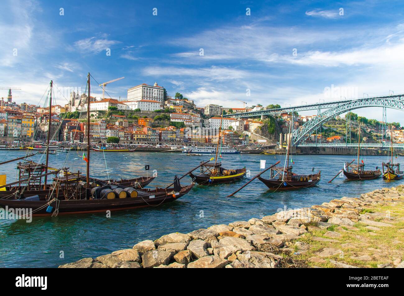 Portugal, city landscape Porto, wooden boats with wine port barrels close  up on Douro, panoramic view of the old town Porto, The Eiffel Bridge view  Stock Photo - Alamy