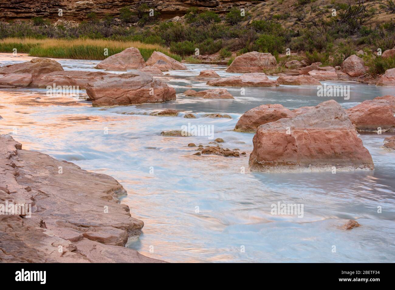 Flowing water and exposed rocks in the Little Colorado River, Grand Canyon National Park, Arizona, USA Stock Photo
