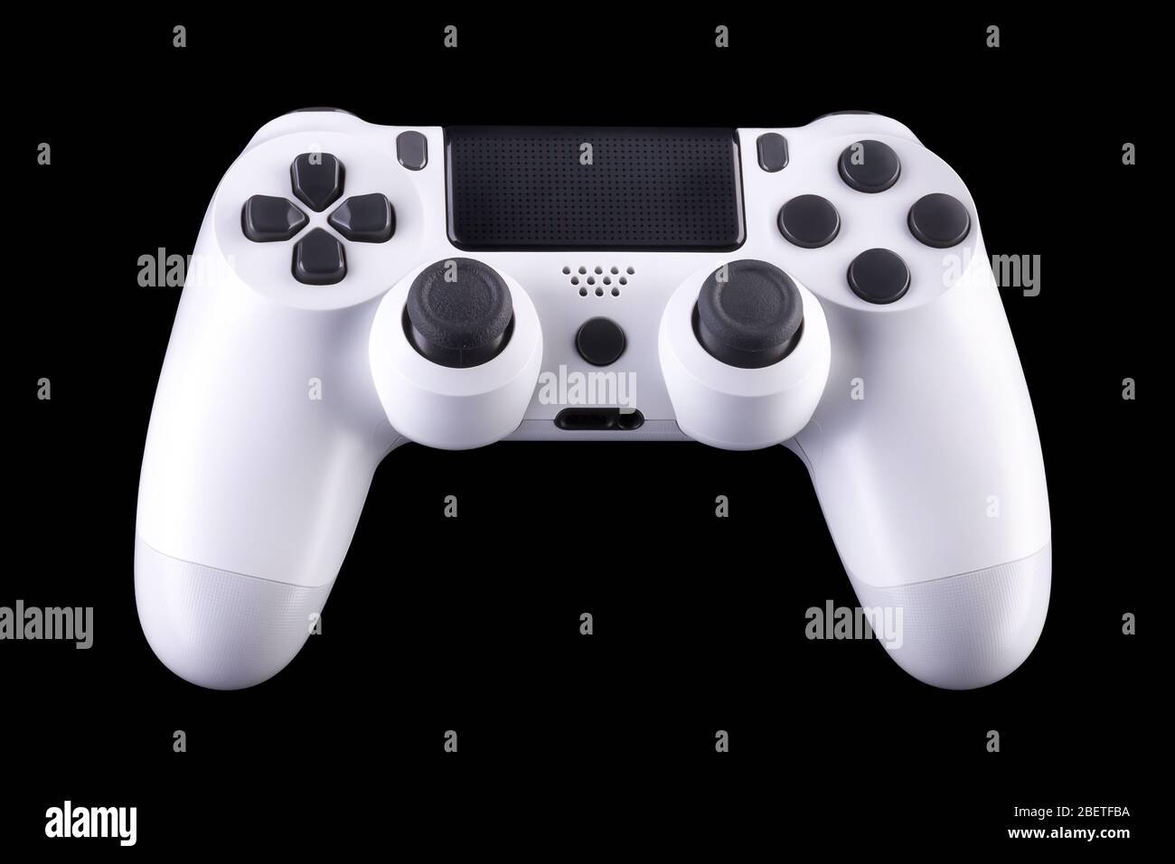 White video game joystick gamepad isolated on a black background Stock ...