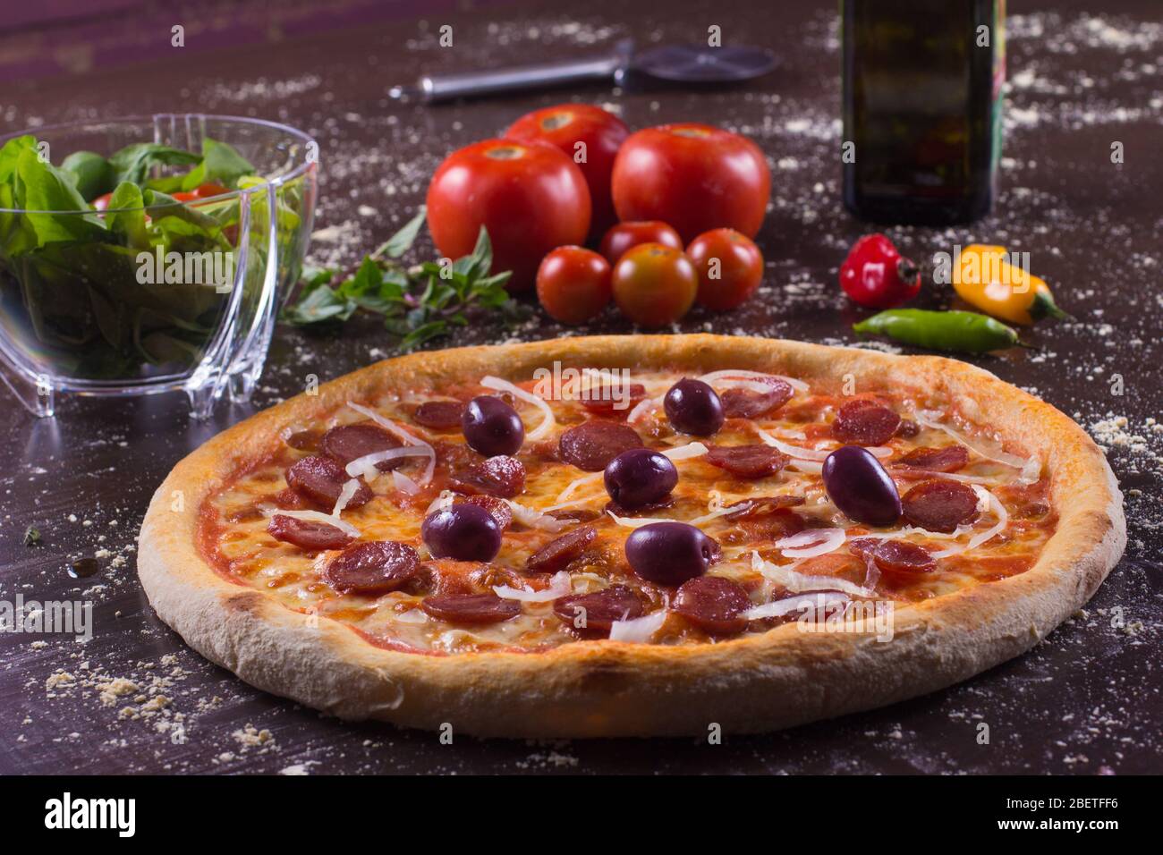 Brazilian Calabresa Pizza with olives and onions Stock Photo