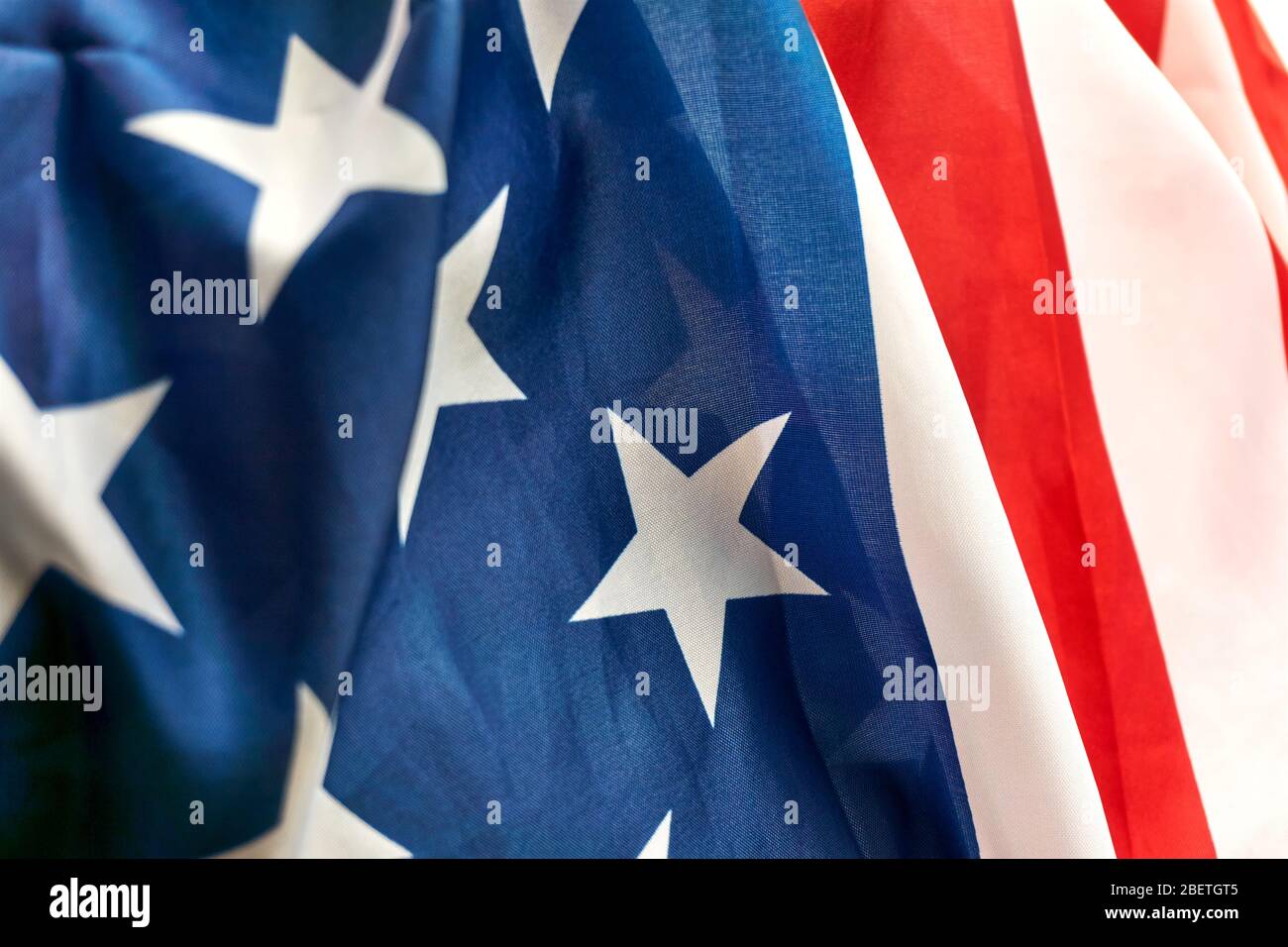 Detail of the American flag in red, white and blue with stars and ...