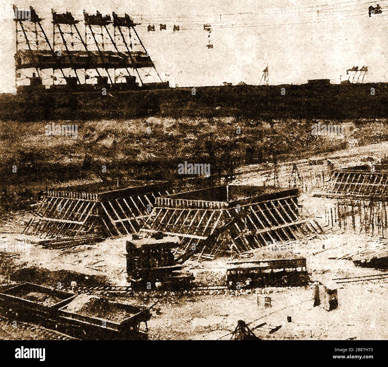 An early printed photograph showing the building of the Panama Canal  - Transporting large amounts of concrete to the site. Stock Photo