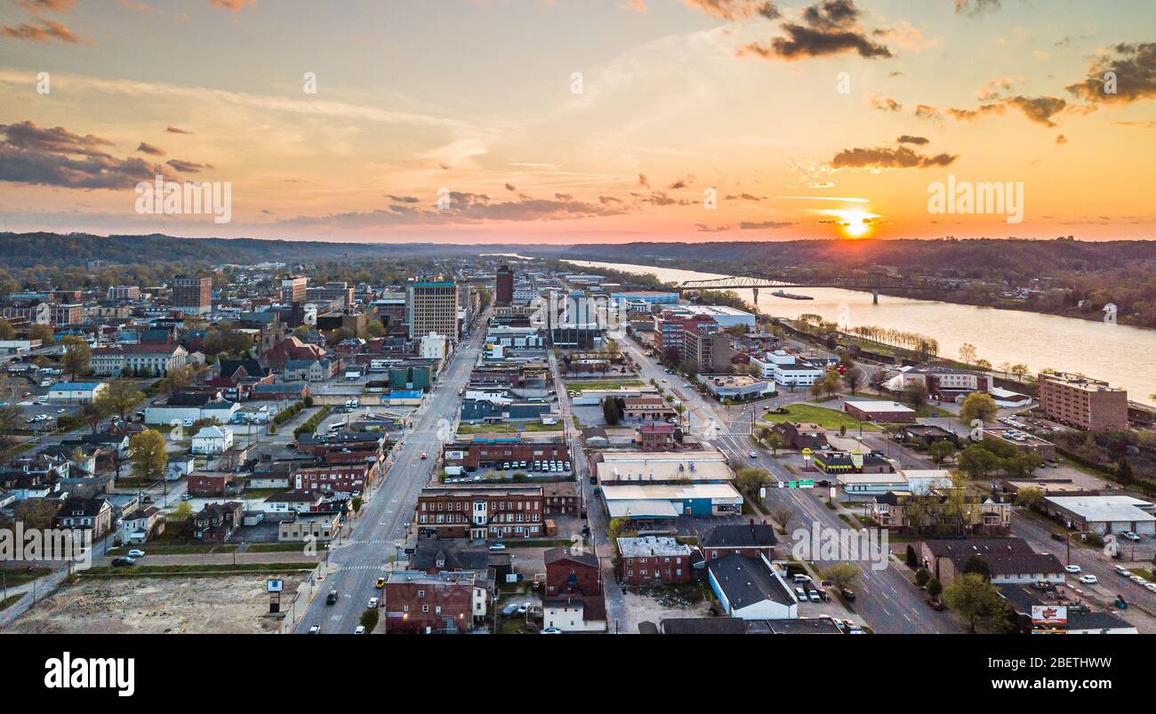 The sun sets over downtown Huntington, West Virginia and the Ohio River