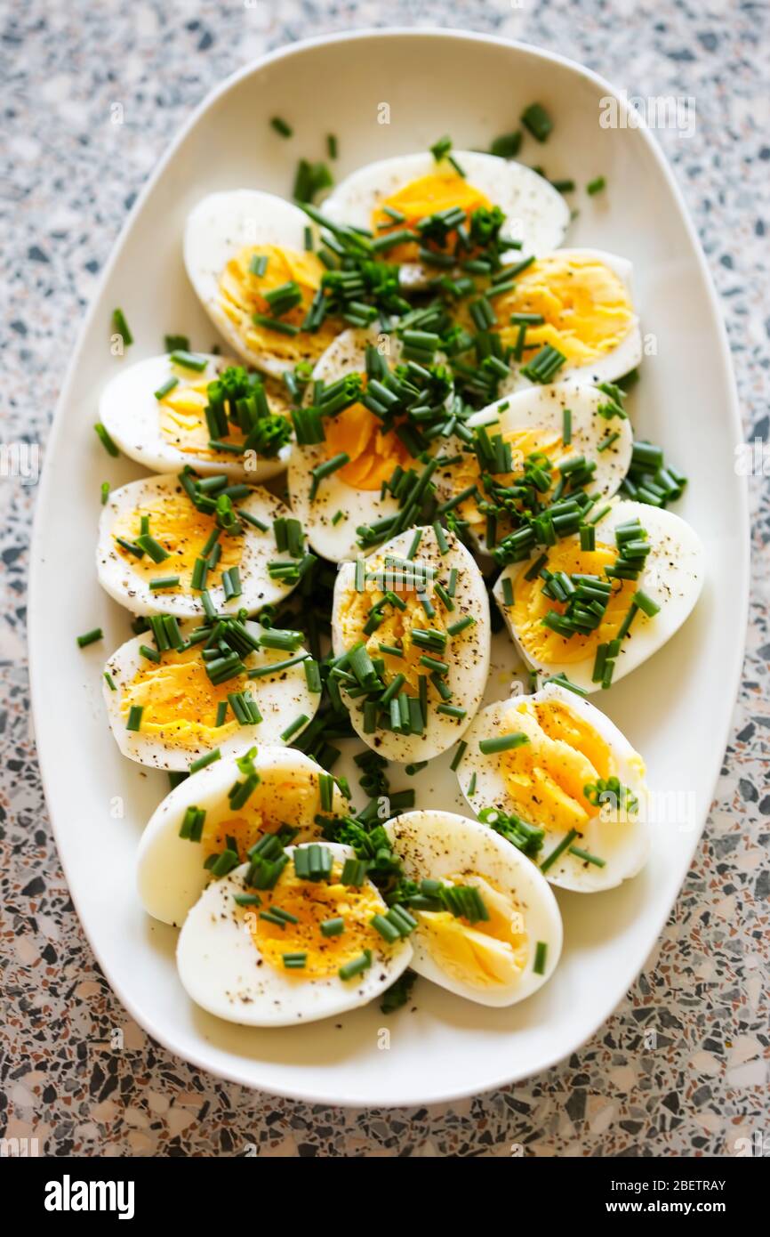 Hard boiled eggs with chives polish Easter breakfast Stock Photo Alamy