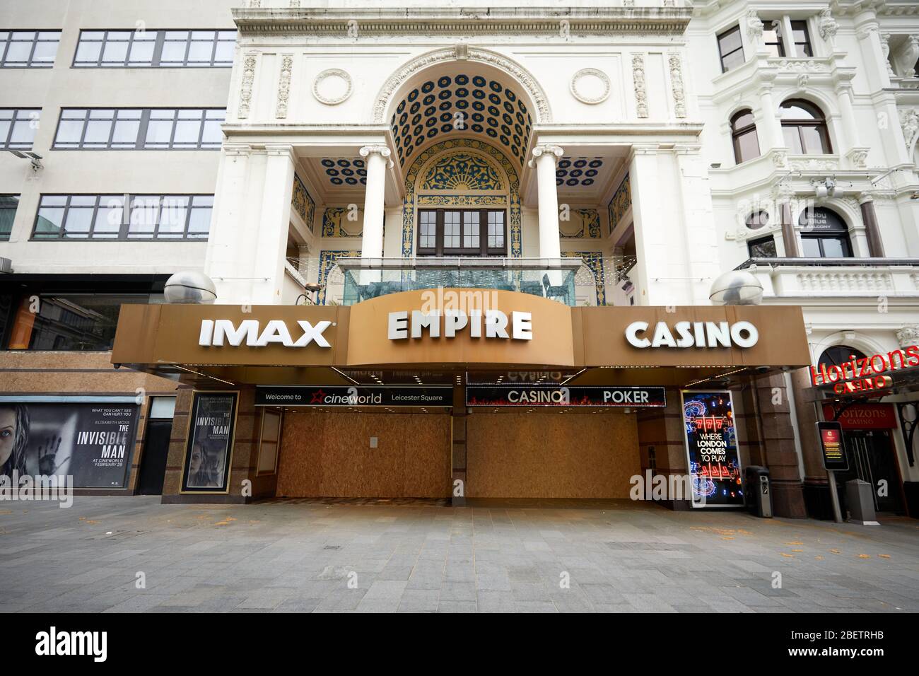 London, U.K. - 13 Apr 2020: The entrance of the Empire Leicester Square, which has been closed and boarded-up during the coronavirus lockdown. Stock Photo