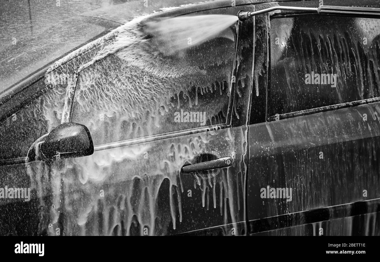 Car in industrial car wash, hygiene and cleaning of vehicles Stock Photo