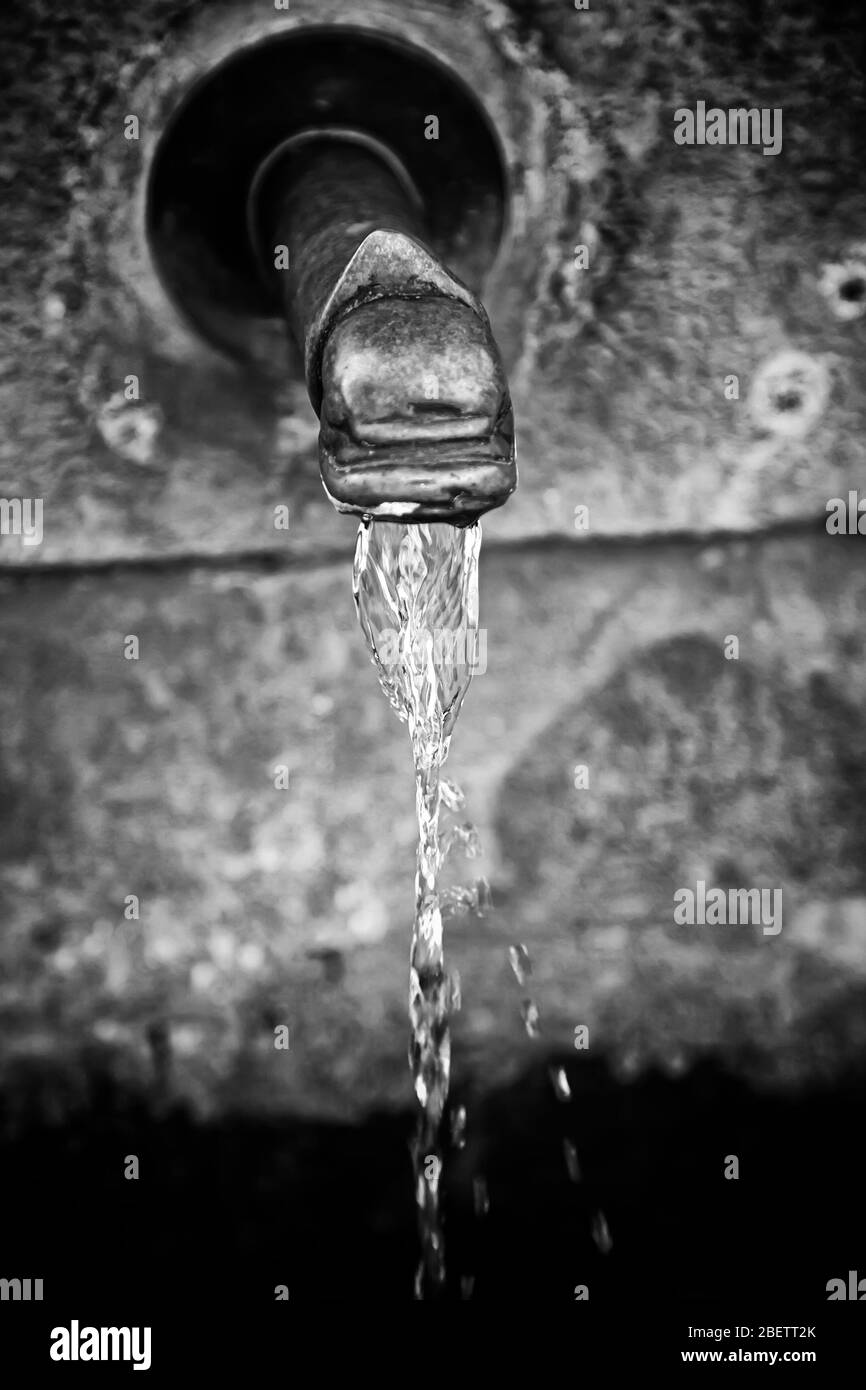 Spout with water, cool down and drink Stock Photo