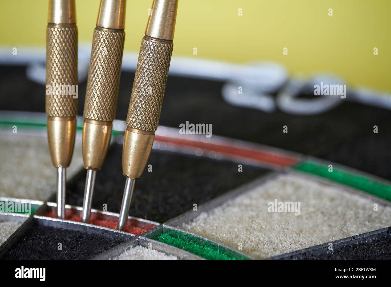 Three darts on triple ring target of dartboard, concept of victory and goal  achievement, selective focus Stock Photo - Alamy