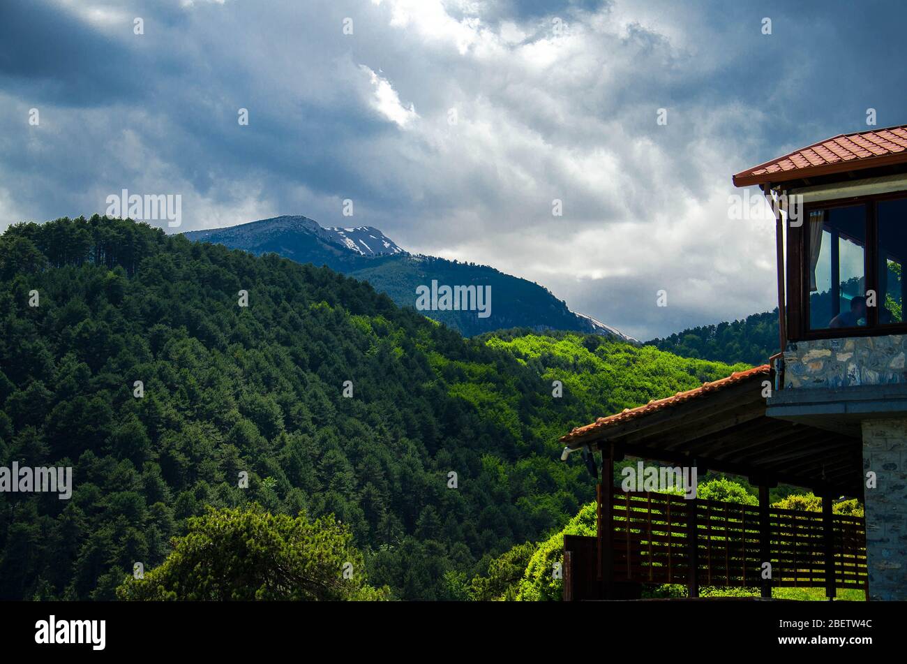 View of mountains Olympus seen from viewing platform near building of tavern cafe, Pieria, Macedonia, Greece Stock Photo