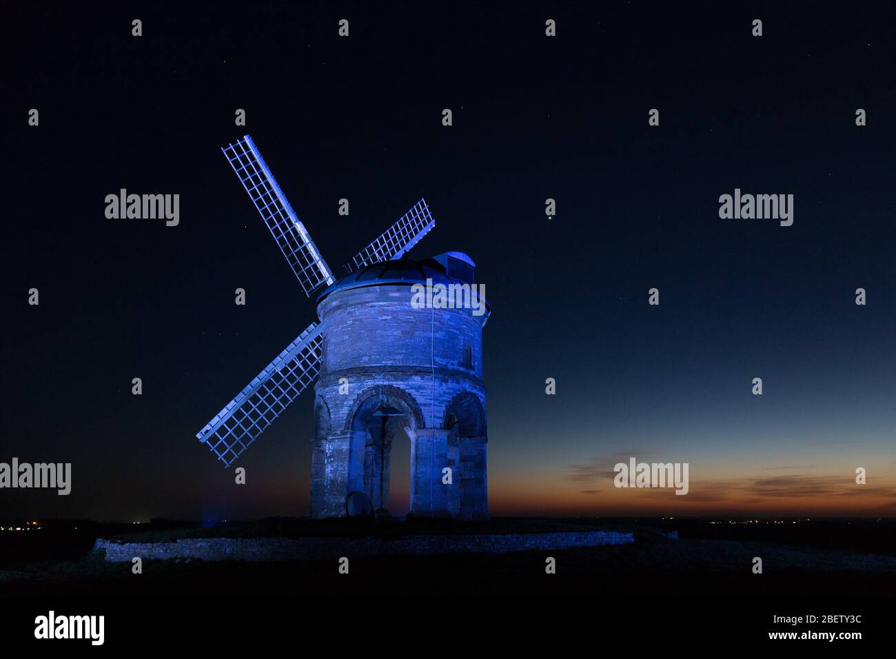 Chesterton, Warwickshire, UK. 15th Apr, 2020. The 17th century Grade 1 listed windmill at Chesterton, near Leamington Spa, Warwickshire, is illuminated with blue light in support of the NHS and other key workers. Credit: Peter Lopeman/Alamy Live News Stock Photo