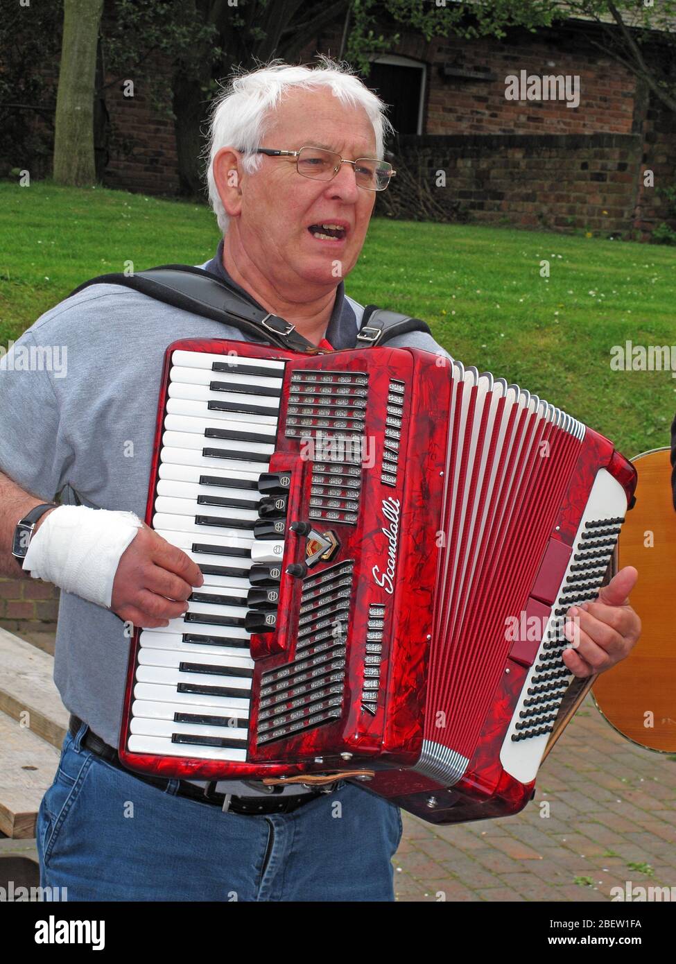 Scandalli Accordion player, accordionist, Cheshire , England, UK built in Camerano, Italy, Europe Stock Photo