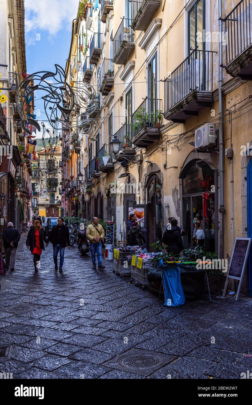 A typical narrow street of Salerno historic center. Salerno, Campania, Italy, December 2019