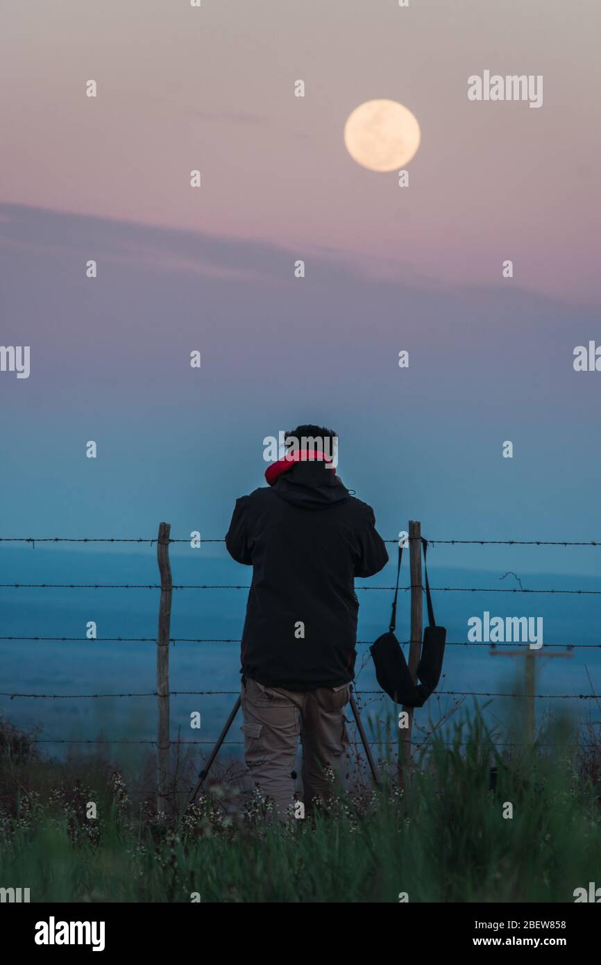Photographer Capture The Full Moon Stock Photo Alamy Photographer Capture The Full Moon Stock Photo Alamy