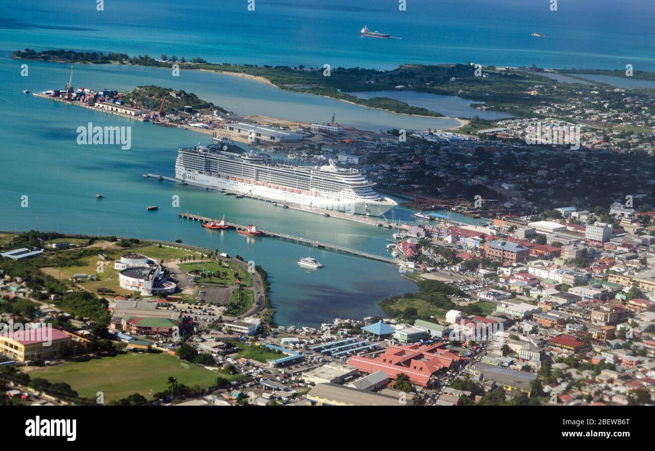 St John's, Antigua - January 3, 2020: Aerial view of the Cuise Port at St John's, Antigua and Barbuda with the ship MSC Preziosa docked on a sunny Jan Stock Photo