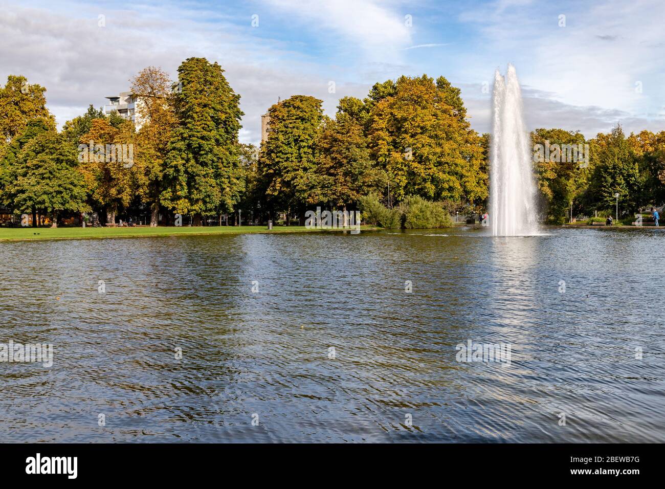 Fountain, Lake and trees at Eckensee park, Stuttgart, Germany Stock ...