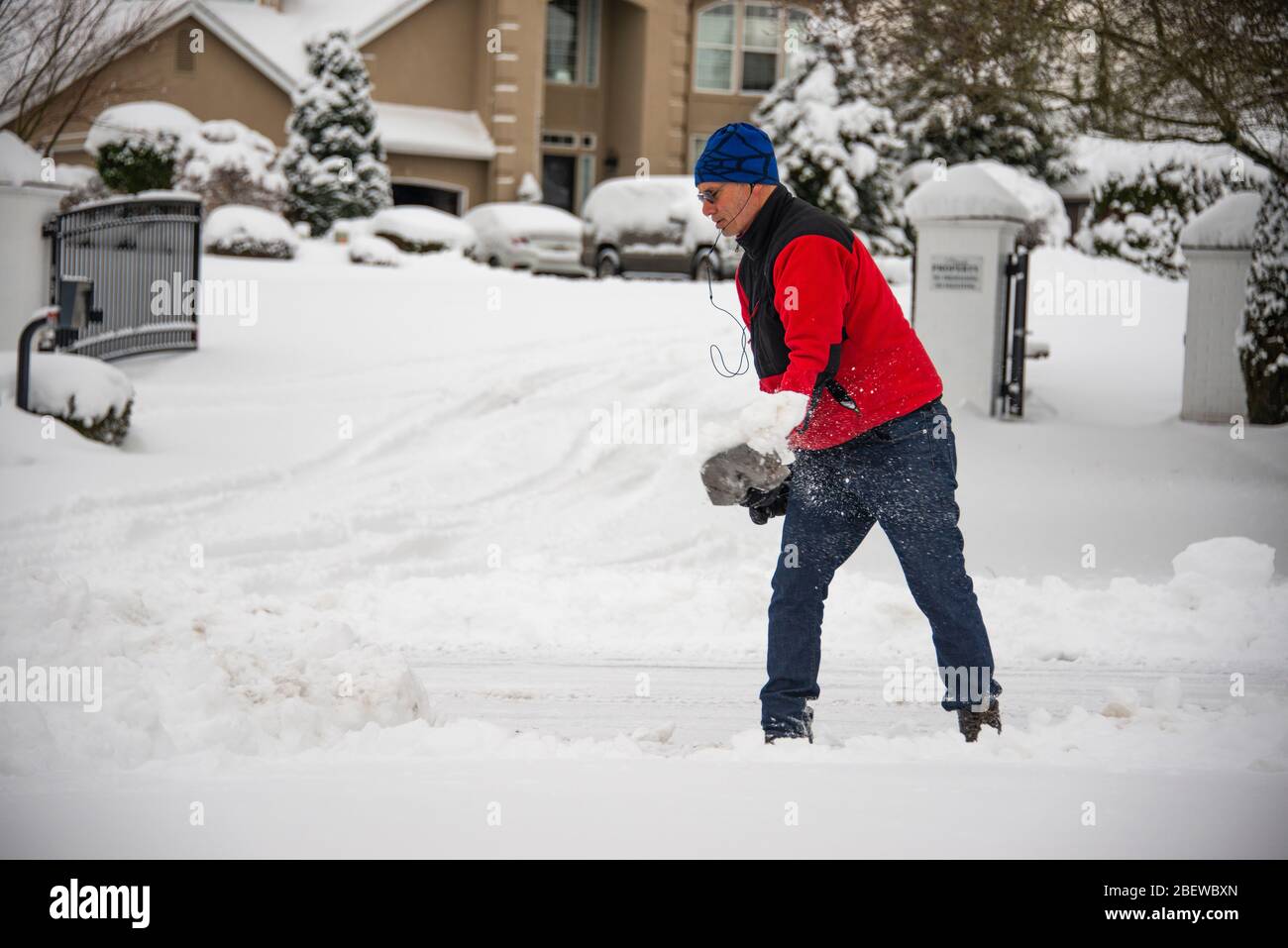 Man shoveling snow Stock Photo
