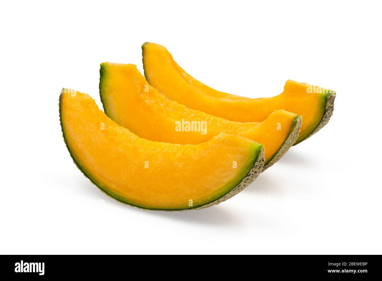 Organic japanese cantaloup melon slices on white isolated background