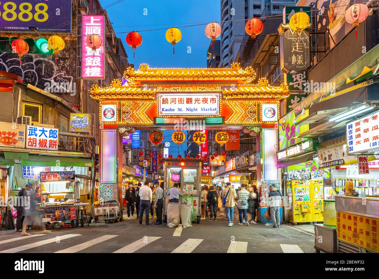 Taipei, Taiwan - March 29, 2020 : night view of the entrance of Raohe Street Night Market, one of the oldest and most famous night markets in Taipei, Stock Photo