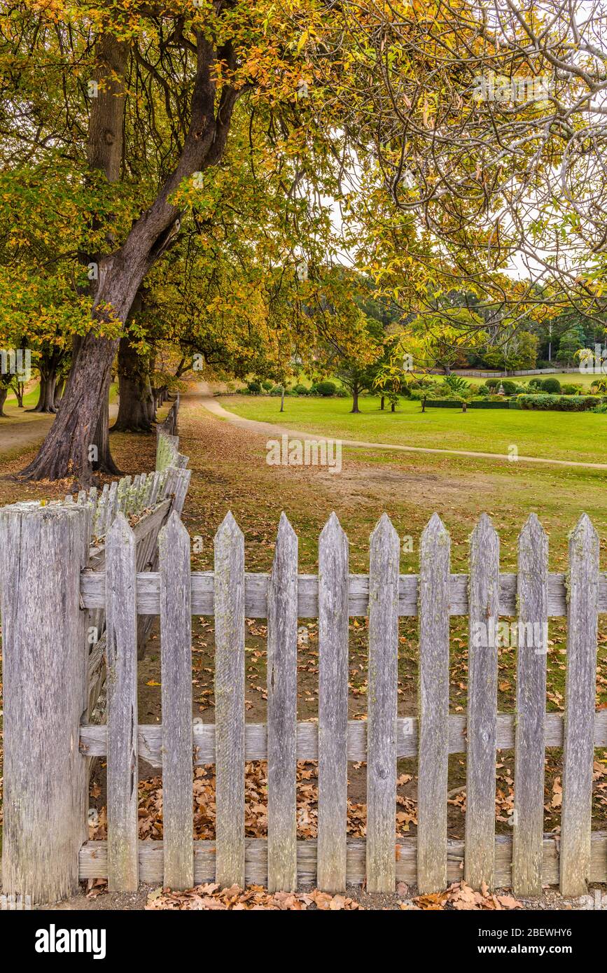 Section of white paling fence surrounding the governors garden at Port Arthur's colonial penal colony in Tasmania, Australia. Stock Photo