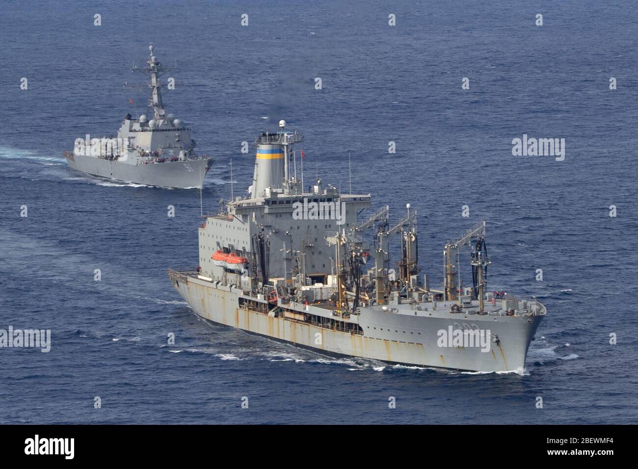 PACIFIC OCEAN (April 8, 2020) U.S. Navy fleet replenishment oiler USNS Laramie (T-AO 203) steams ahead of the Arleigh Burke-class guided-missile destroyer USS Pinckney (DDG 91) before a replenishment-at-sea. Pinckney is deployed to the U.S. Southern Command area of responsibility to support Joint Interagency Task Force South’s mission, which includes counter illicit drug trafficking in the Caribbean and Eastern Pacific. (U.S. Navy photo by Mass Communication Specialist 3rd Class Erick A. Parsons) Stock Photo