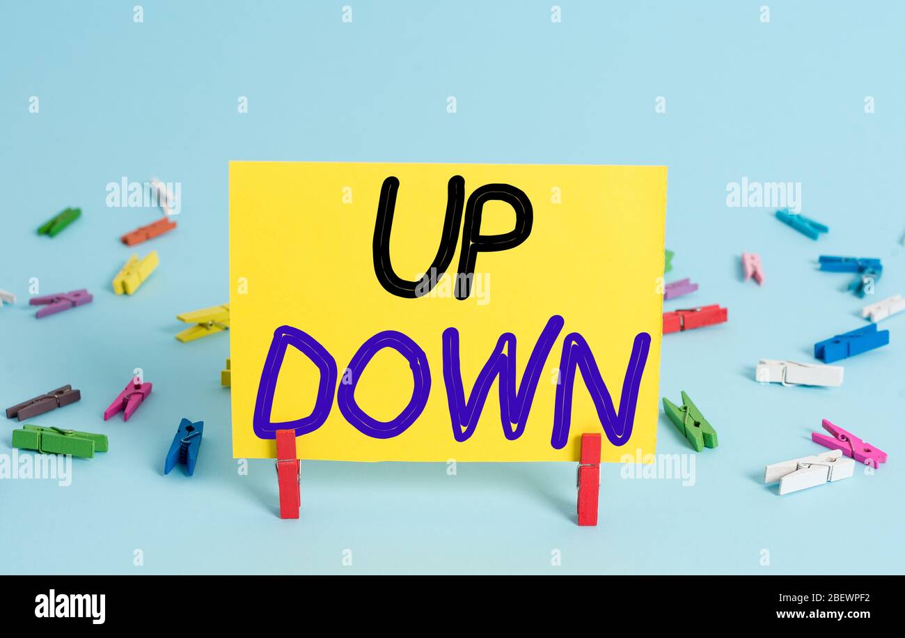 Conceptual hand writing showing Up Down. Concept meaning To look or to ...