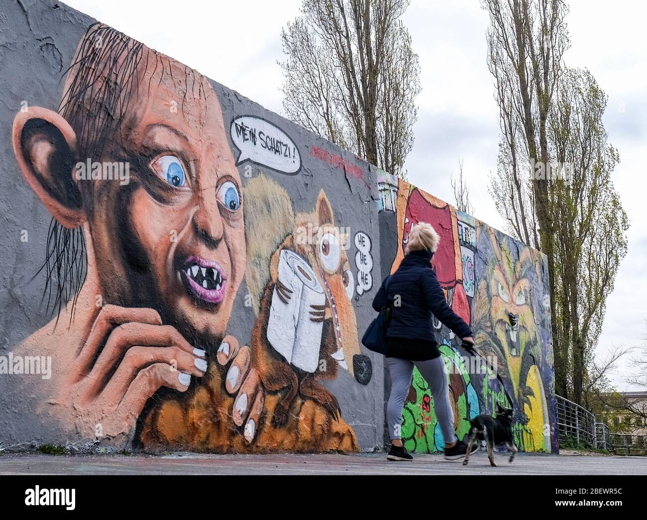 Berlin, Germany. 15th Apr, 2020. A graffito with Gollum, a character from the film 'Lord of the Rings' and Scrat, a sabre-toothed squirrel from the film 'Ice Age', can be seen on a wall in Mauerpark with a roll of toilet paper. During the Corona Crisis, there are ongoing hamster purchases of toilet paper in Germany. Credit: Jens Kalaene/dpa-Zentralbild/ZB/dpa/Alamy Live News Stock Photo