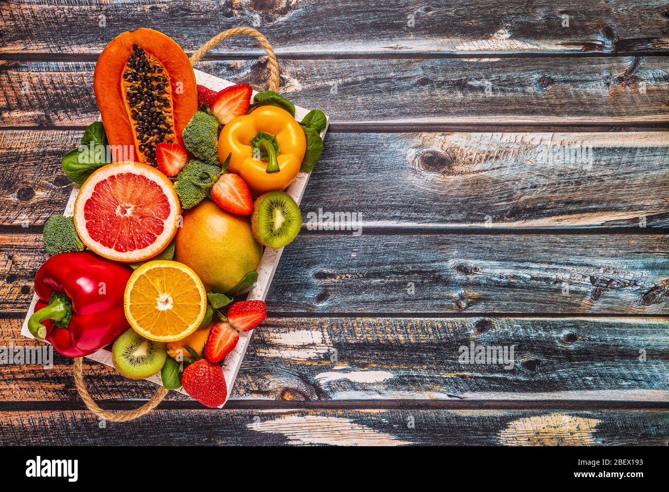 Fruits and vegetables rich in vitamin C in box. Healthy eating. Top