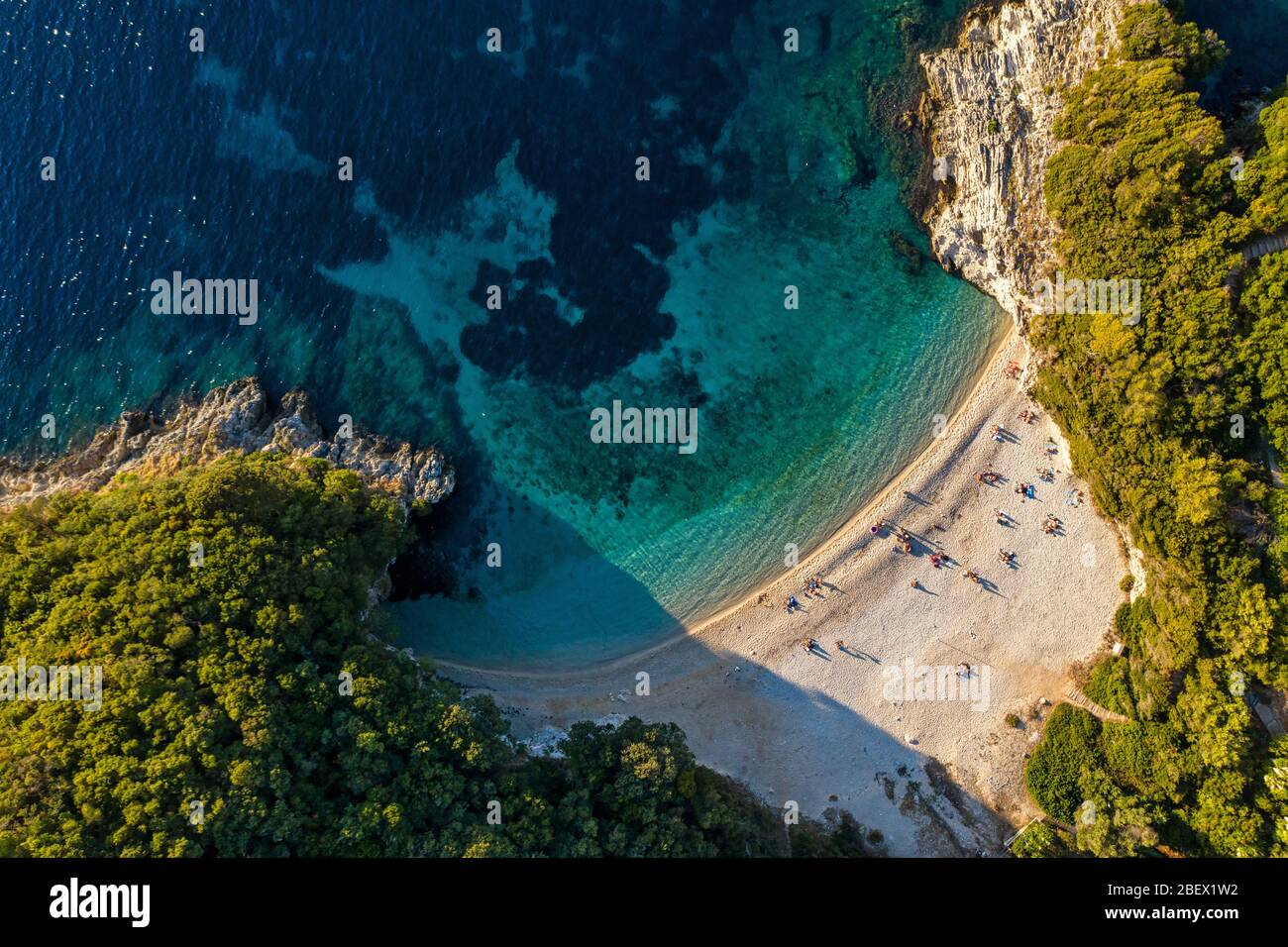 Aerial of secluded paradise beach in mediterranean sea. Hidden Rovinia