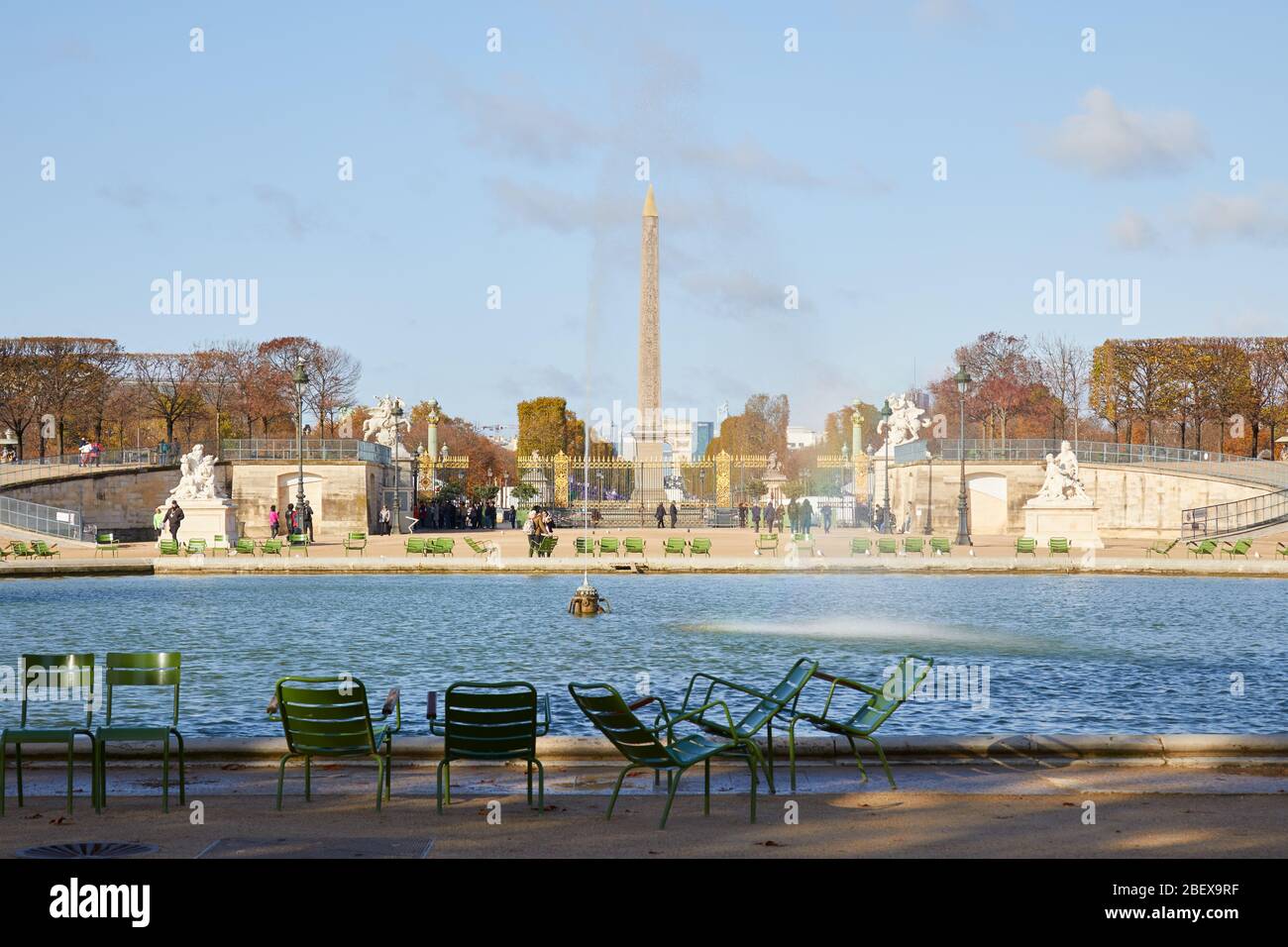 PARIS - NOVEMBER 7, 2019: Tuileries garden fountain and Place de la Concorde obelisk view, sunny autumn in Paris Stock Photo