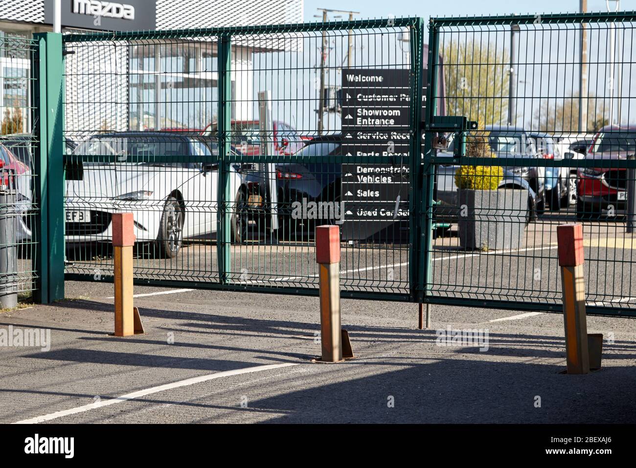 security bollards and closed gates at car dealership due to coronavirus