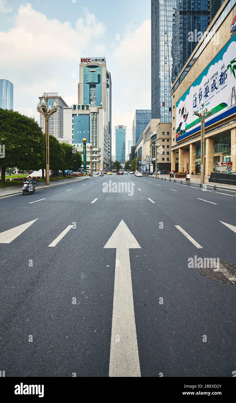 Chengdu, China - September 29, 2017: Direction arrow road marking on a street in downtown Chengdu. Stock Photo