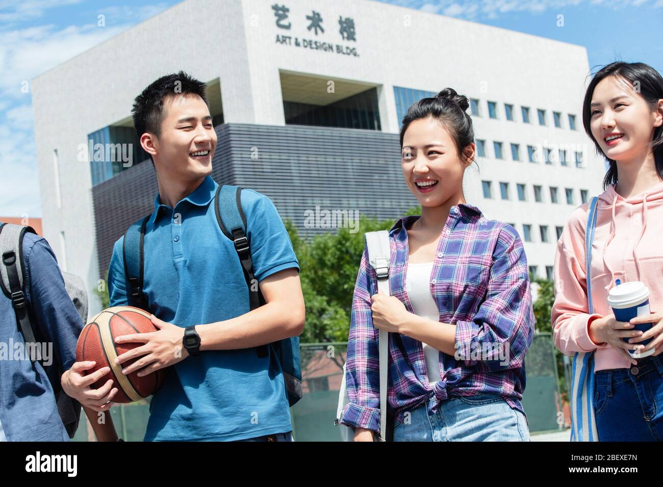 Happiness of college students walking in the campus Stock Photo