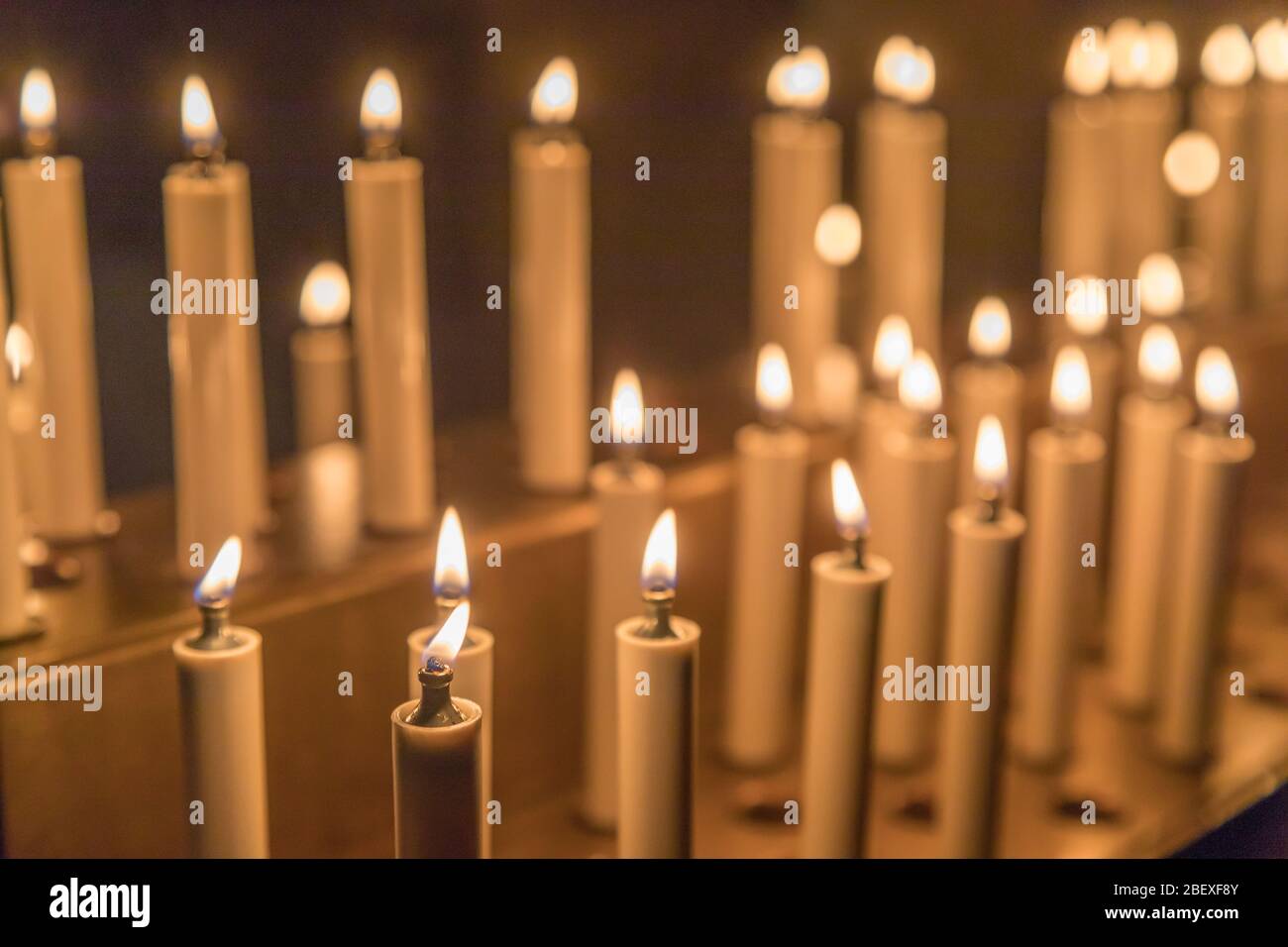 victim candles in the church Stock Photo