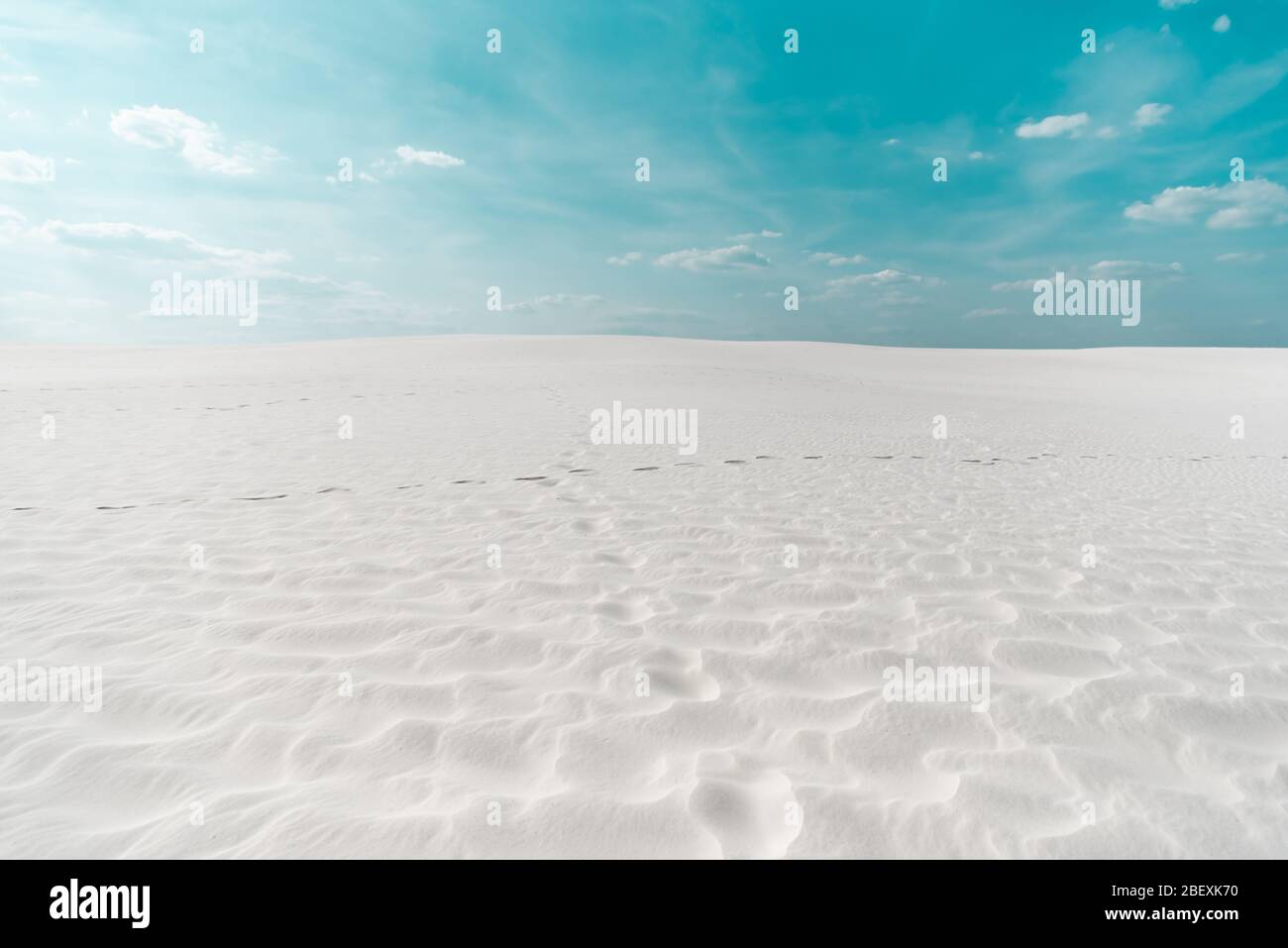 beautiful clean beach with white sand and blue sky with white clouds ...