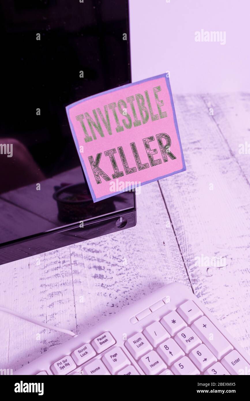 Writing note showing Invisible Killer. Business concept for presence ...