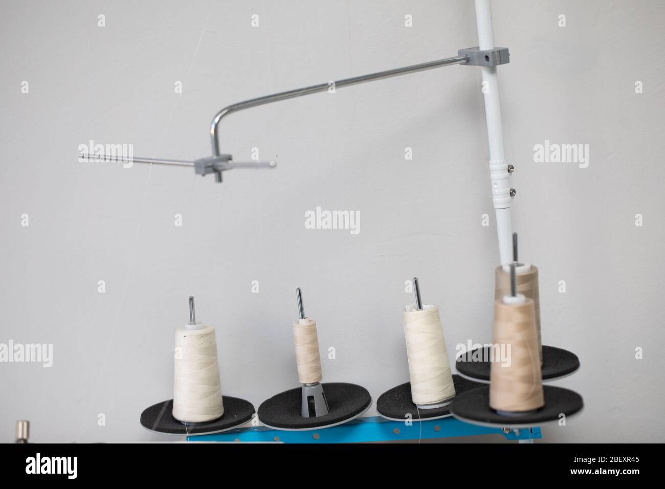 The overlock sewing machine is used to finish the edges of materials such as skirts, dresses and