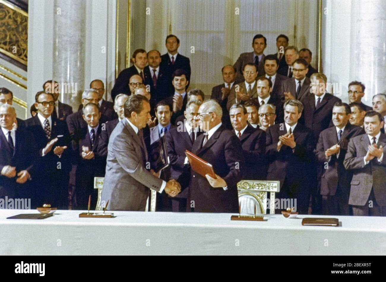 President Nixon and Nikolay Podgorny (Chairman of the Presidium of the Supreme Soviet of the USSR) sign agreements in cooperation between the United States and USSR in the fields of environmental protection, medical science, and public health at St. Vladimir Hall in the Grand Kremlin Palace, Moscow. Stock Photo