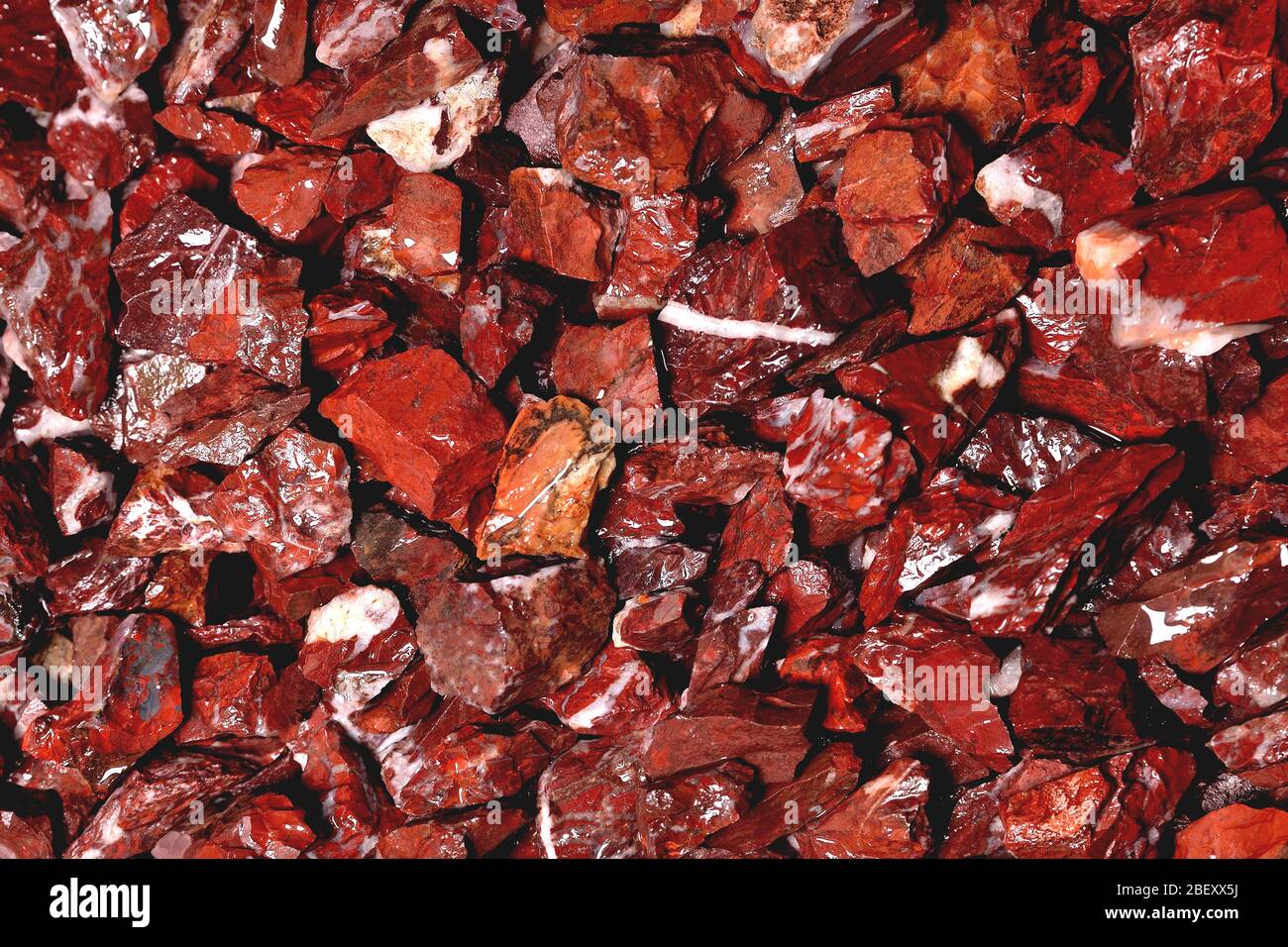 small wet granite maroon stones with sharp edges of heterogeneous texture background Stock Photo Alamy
